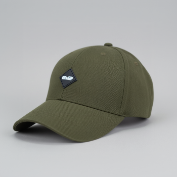 Man wearing an olive cap with an EV2 Logo on a plain background